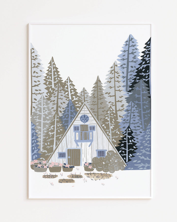 White Framed Artwork titled 'Alpine Retreat', featuring a charming A-frame cabin nestled among towering pines, created by little Berries Studio.