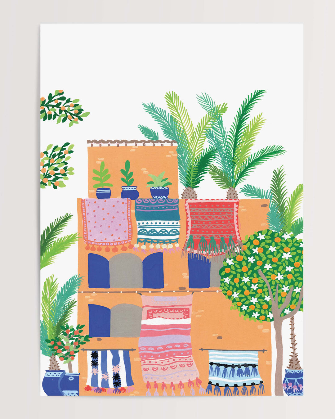 Colourful Illustration of a terracotta building with vibrant rugs hanging from balconies, surrounded by lush greenery and palm trees, by Little Berries Studio.