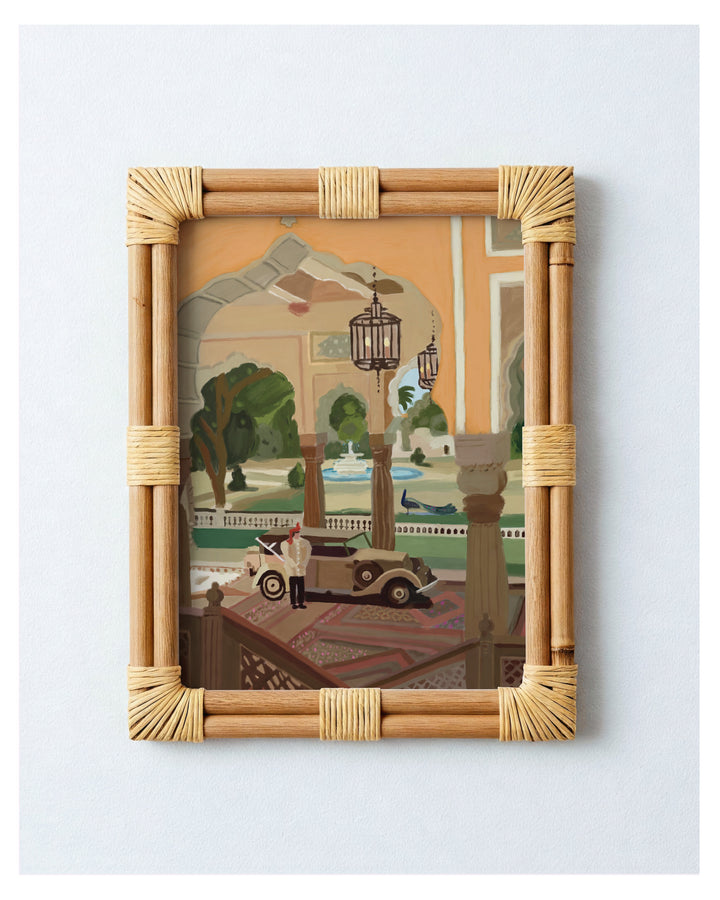 Decorative artwork with a rattan frame featuring an artistic depiction of a scene of Jaipur Courtyard.