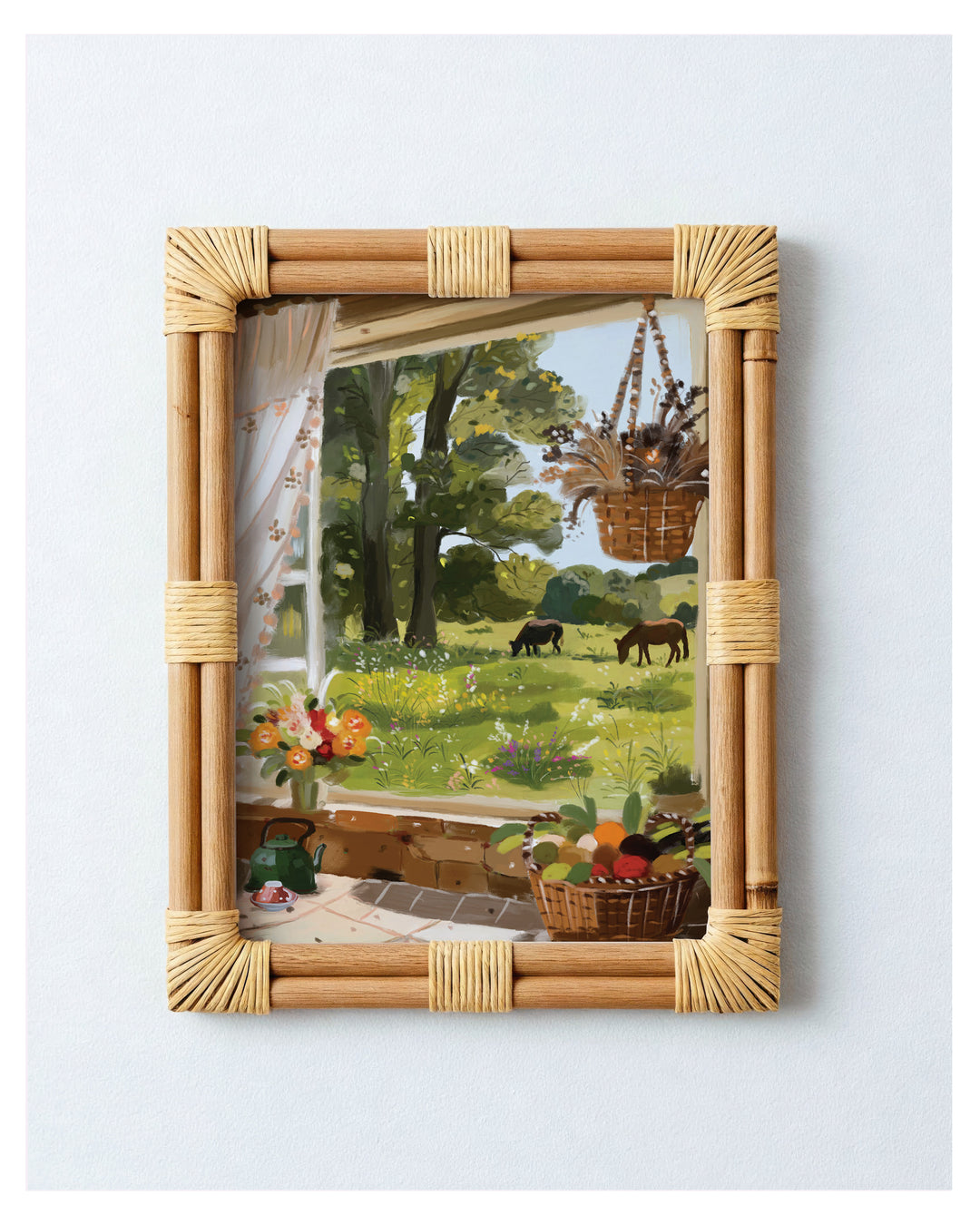 Rattan-framed Art print with a garden scene.