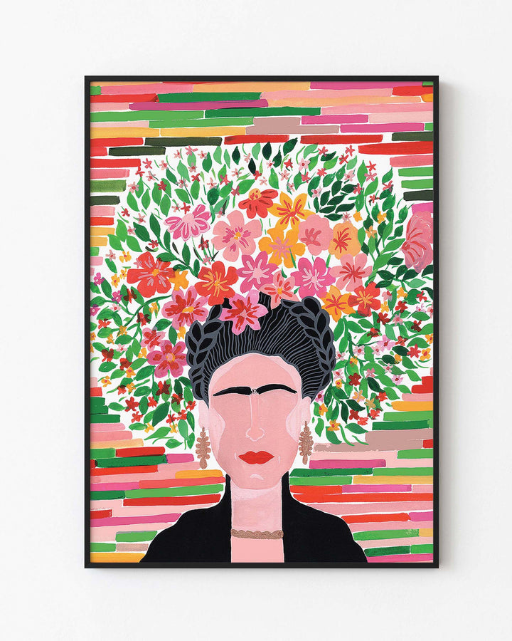 Black Framed Artwork of a glorious Frida with a lush floral crown, featuring various vibrant flowers and leaves against a striped background, created by Little Berries Studio.
