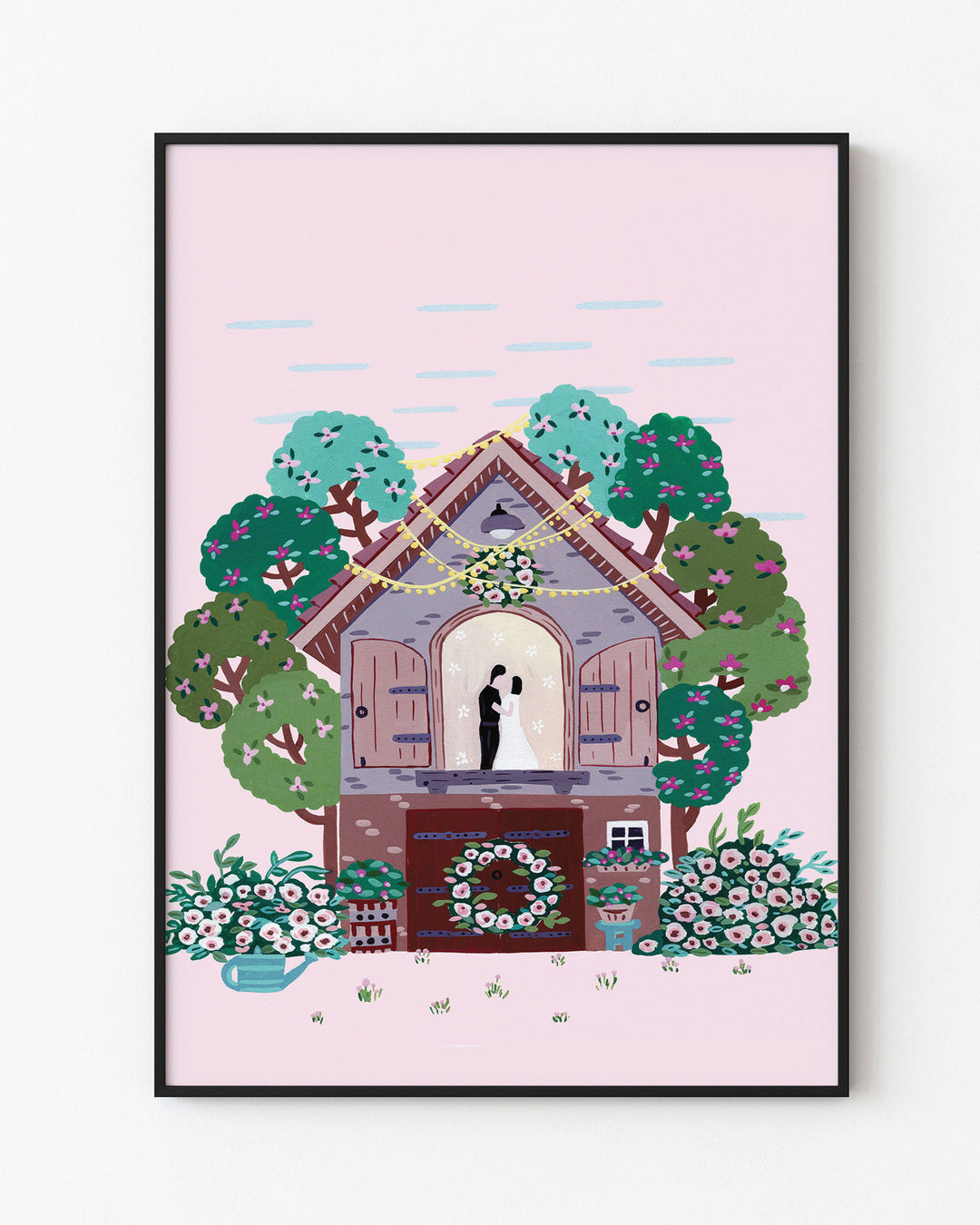 Black Framed Art Print of a couple embracing inside a small cottage adorned with flowers and surrounded by colourful trees, with a pink sky in the background created by Little Berries Studio.