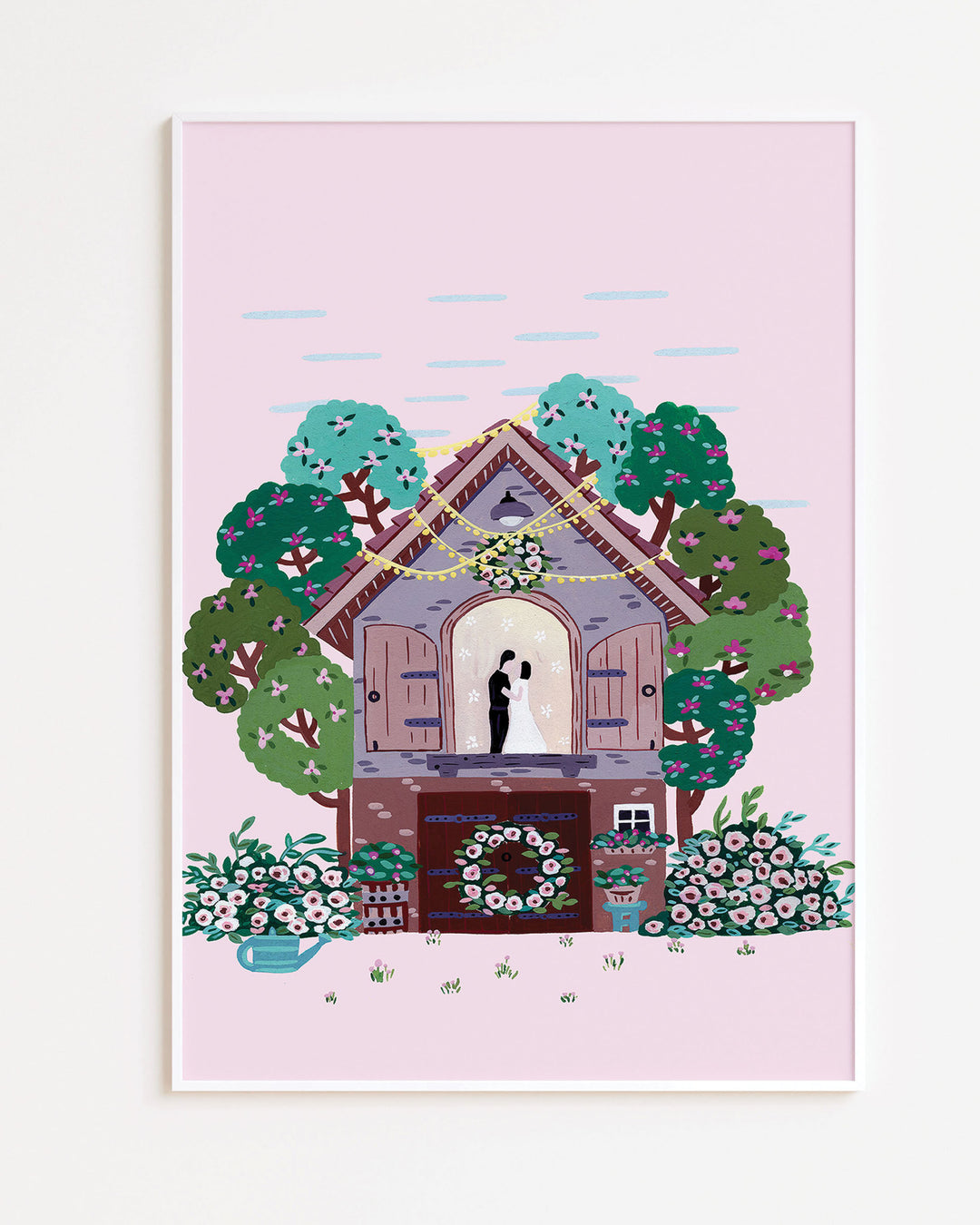 White Framed Art Print of a couple embracing inside a small cottage adorned with flowers and surrounded by colourful trees, with a pink sky in the background created by Little Berries Studio.