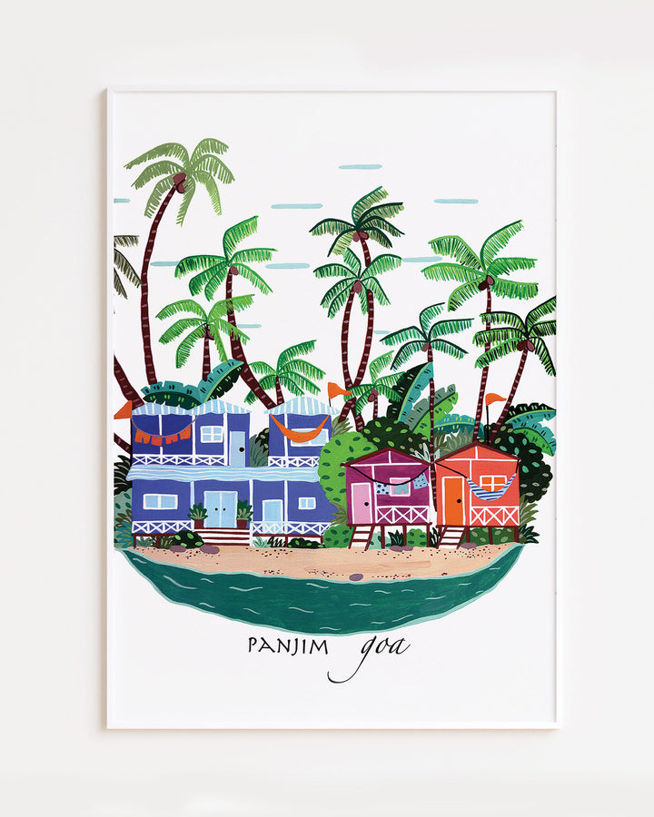White Framed Artwork of colourful beach houses and palm trees in Panjim, Goa by Little Berries Studio, showcasing the tropical charm of this popular Indian coastal destination.