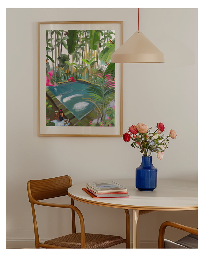 Room interior with a table, chair, vase with flowers, and framed artwork on the wall.