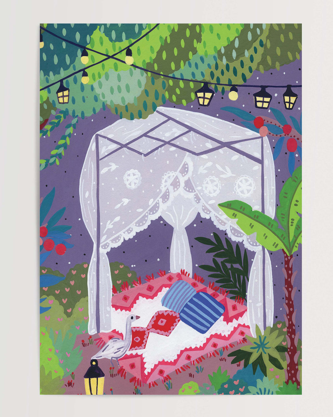 A whimsical Art Print depicting a cozy outdoor scene under a canopy of trees. The centre features a draped canopy bed adorned with lace curtains, resting on a patterned red and white blanket with colourful cushions.