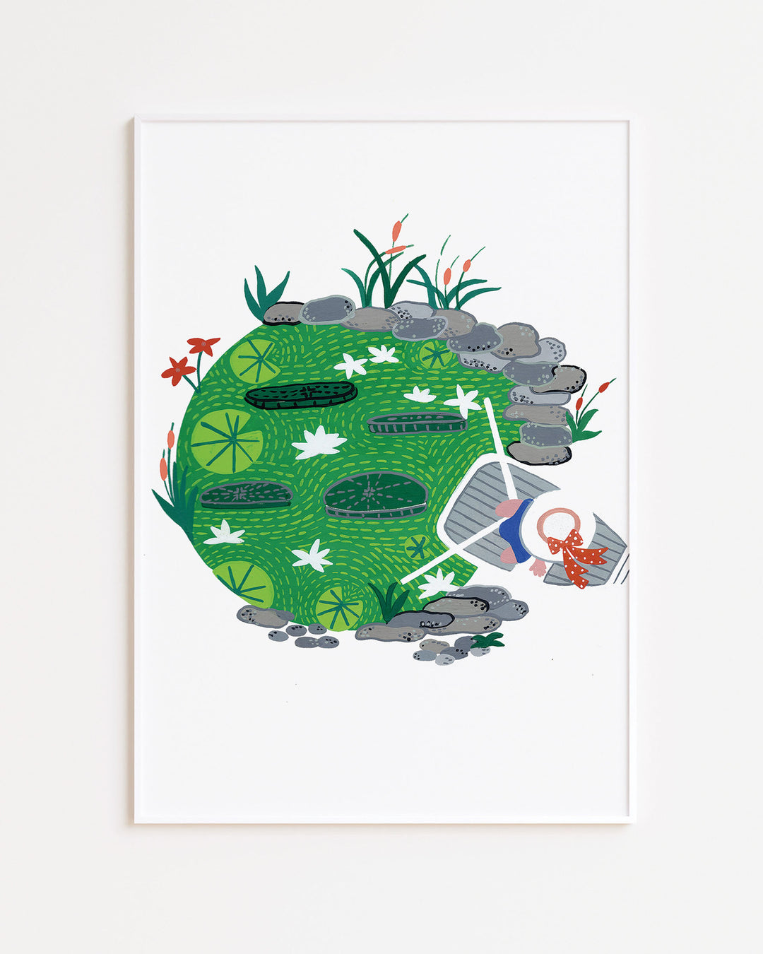 White Framed Artwork "Pondside Dreams" captures a serene pond scene filled with lily pads and vibrant greenery.