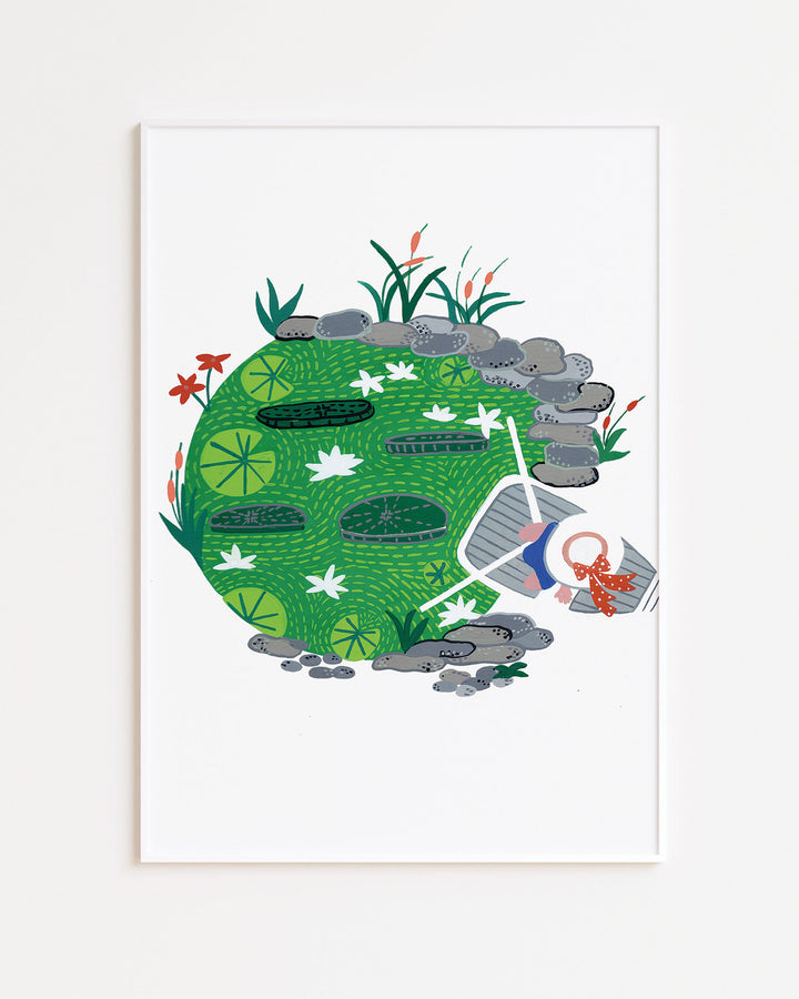 White Framed Artwork "Pondside Dreams" captures a serene pond scene filled with lily pads and vibrant greenery.