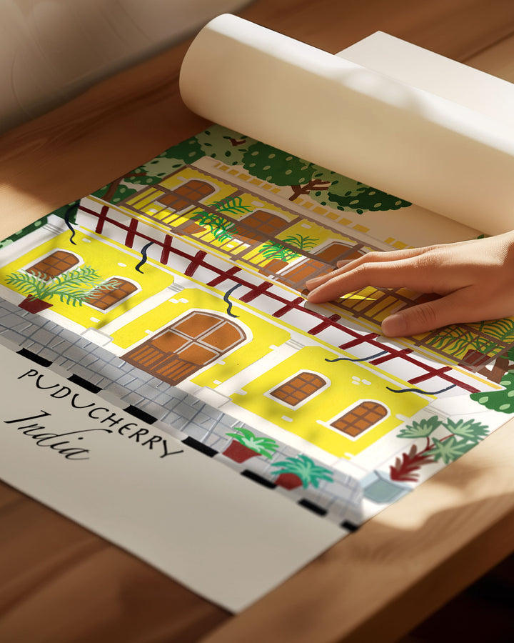 Archival Art Print of a traditional yellow building in Puducherry, India, surrounded by lush greenery. Archival Print by Little Berries Studio.