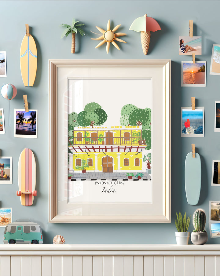 Framed Artwork of a traditional yellow building in Puducherry, India, surrounded by lush greenery. 