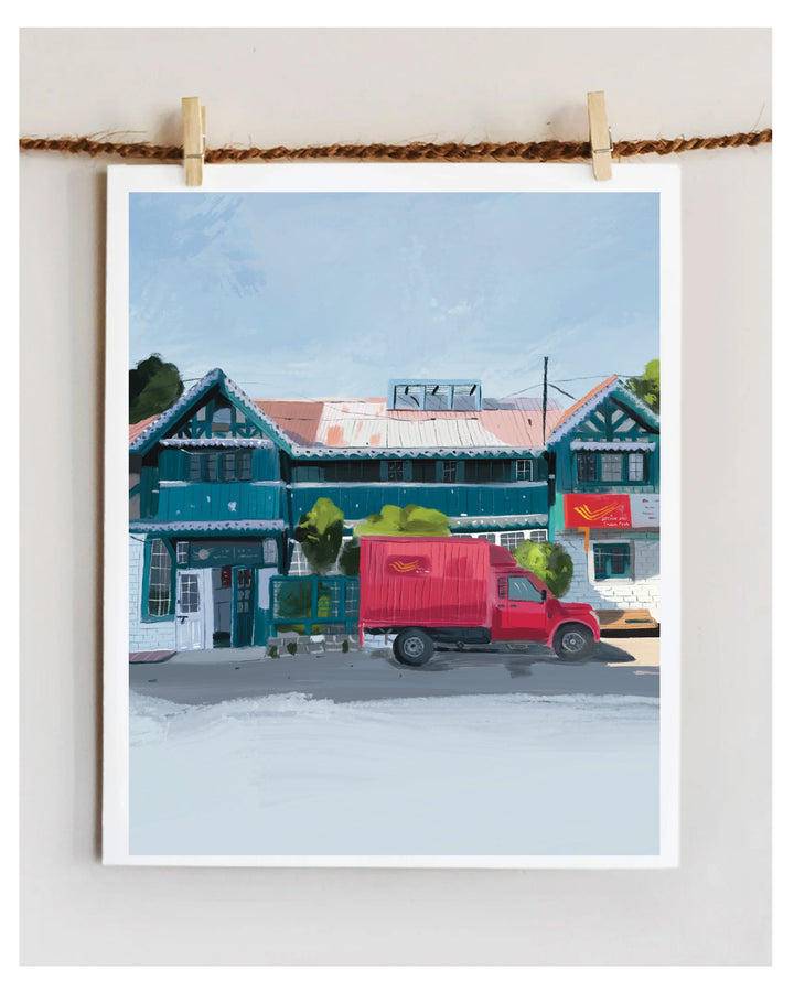 Print of a red truck in front of a Shimla Post Office with a clear sky.