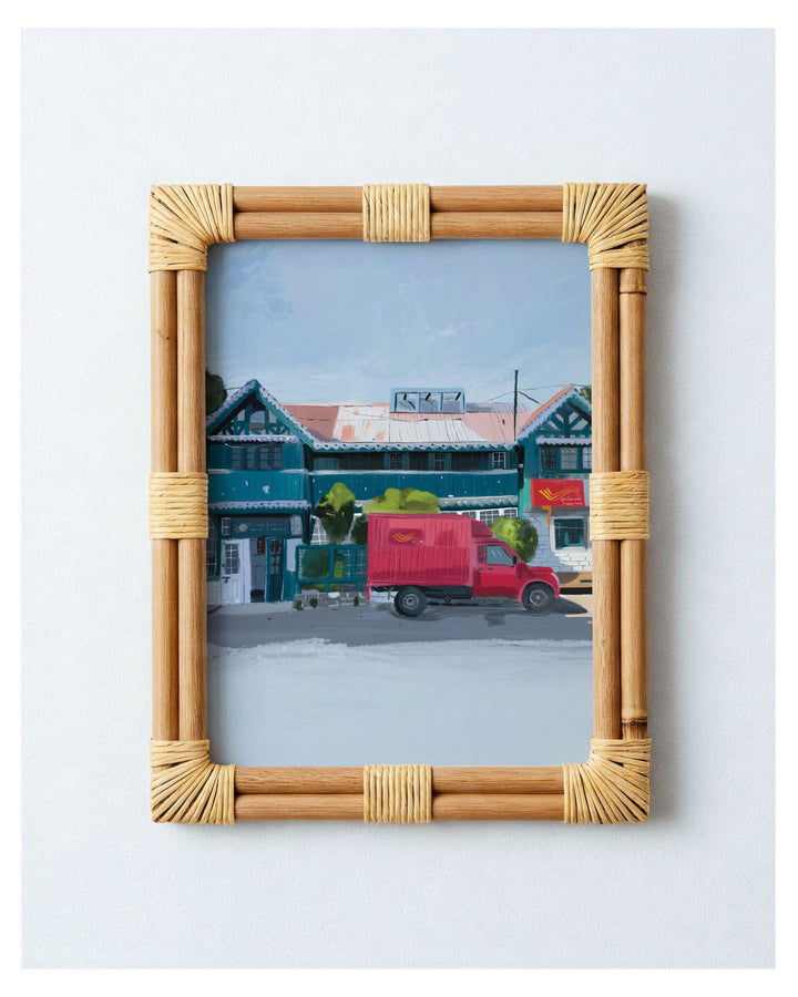 Framed artwork of a street scene with a red truck in front of Shimla Post Office.