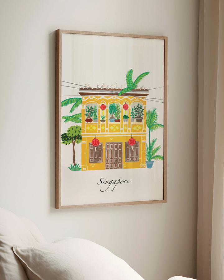 Framed Wall Art of a traditional Singaporean building with lush greenery and red lanterns, capturing the essence of Singapore. Archival Print by Little Berries Studio.