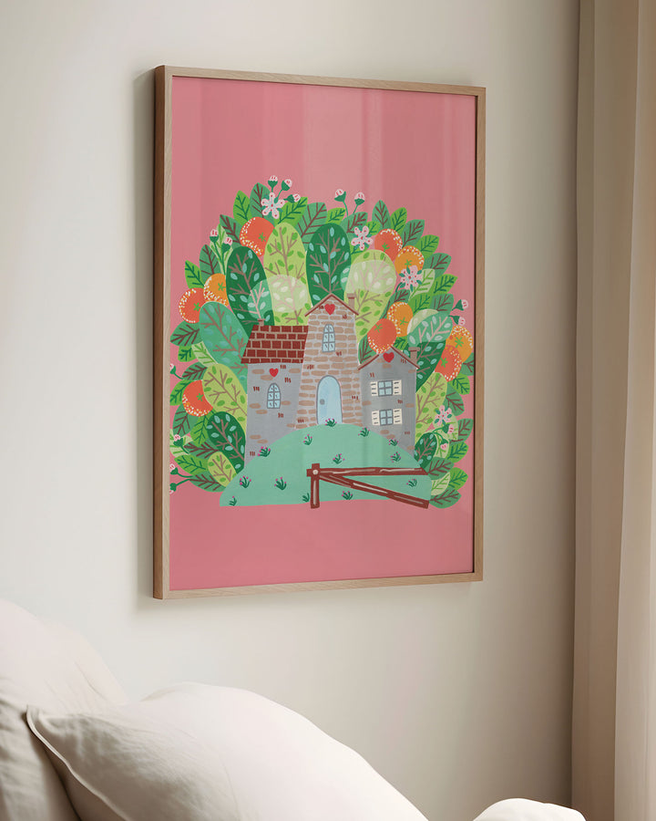 Framed Wall Art of a cozy Smoke House with a blue door and heart details, surrounded by vibrant, blooming foliage on a pink background, ideal for decorating kids rooms.