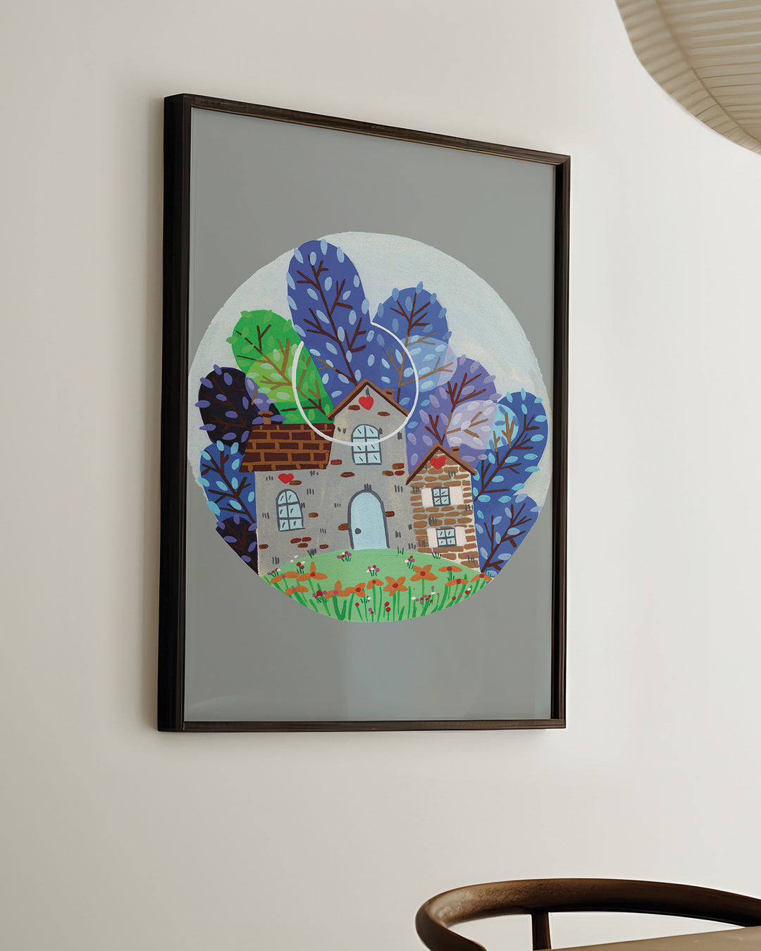 Ready-to-Hang Framed Wall Art of a cozy countryside home surrounded by vibrant blue and green trees under a moonlit sky, created by Little Berries Studio.
