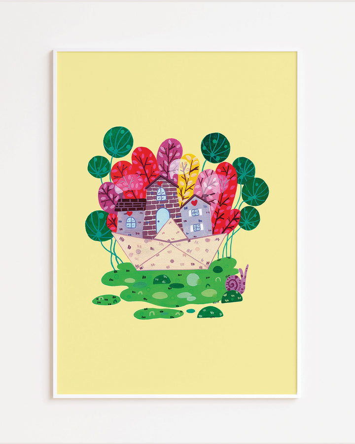 White Framed Wall Art of a cozy stone house nestled in a vibrant meadow, surrounded by colourful trees on a bright yellow background, ideal for decorating children's rooms.