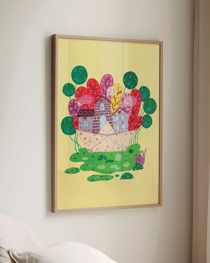 Framed Wall Art of a cozy stone house nestled in a vibrant meadow, surrounded by colourful trees on a bright yellow background, ideal for decorating children's rooms.