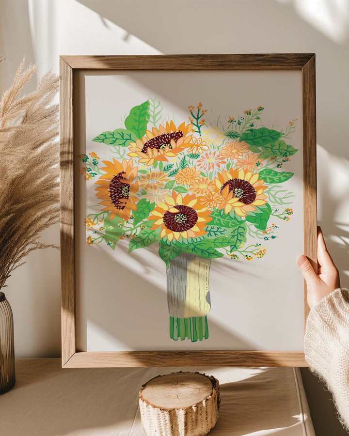 A framed premium Art Print by Little Berries Studio, titled 'Sunny Serenade,' featuring a vibrant bouquet of sunflowers and assorted flowers with green leaves.