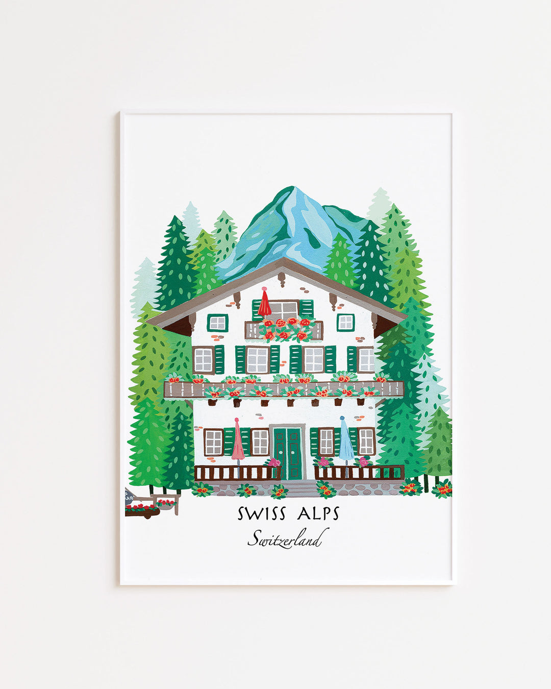 White Framed Artwork of a Swiss alpine chalet surrounded by lush pine trees and mountains, titled 'Swiss Alps, Switzerland,' by Little Berries Studio.
