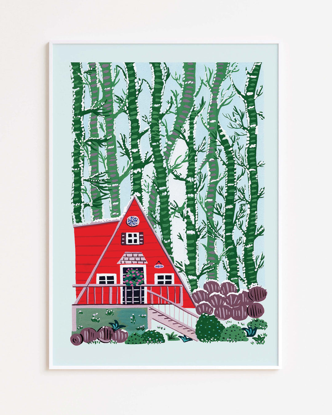 White Framed Artwork "Woodland Hideaway" features a charming red A-frame cabin nestled amidst a dense stand of birch trees.