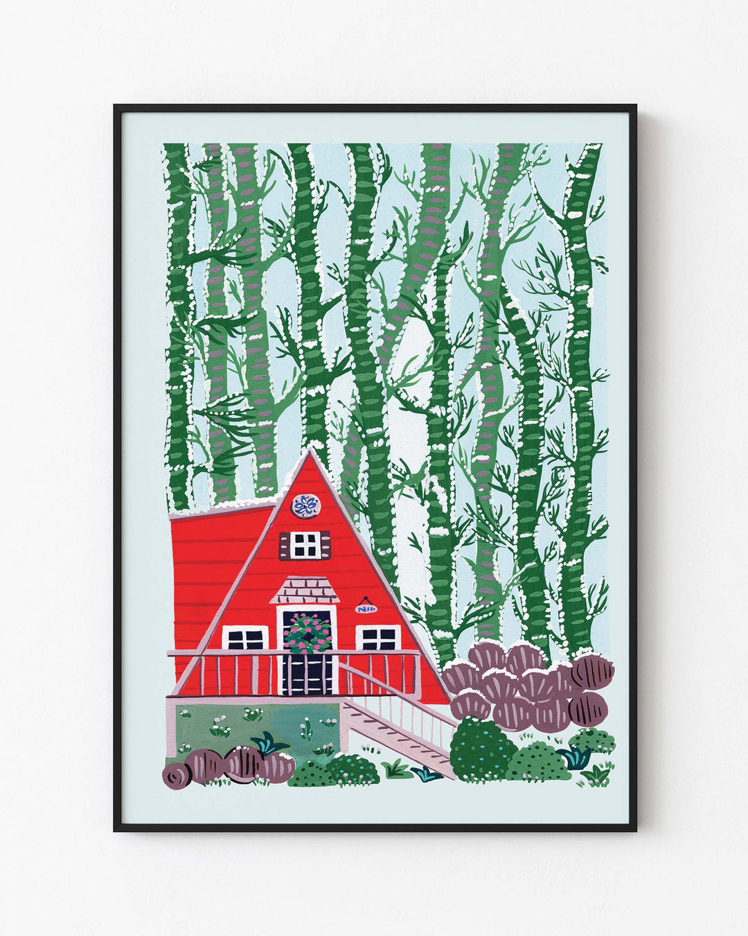 Black Framed Artwork "Woodland Hideaway" features a charming red A-frame cabin nestled amidst a dense stand of birch trees.